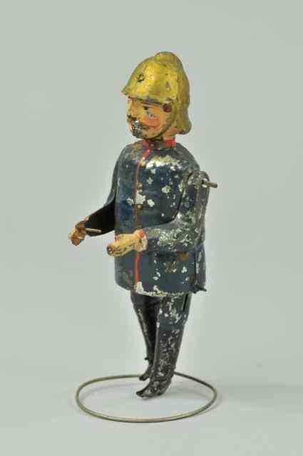 Appraisal: GERMAN FIREMAN Attributed to Gunthermann hand painted tin figure hands