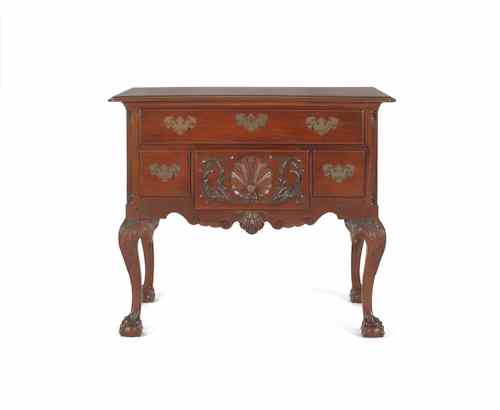 Appraisal: Chippendale style carved mahogany lowboy h w