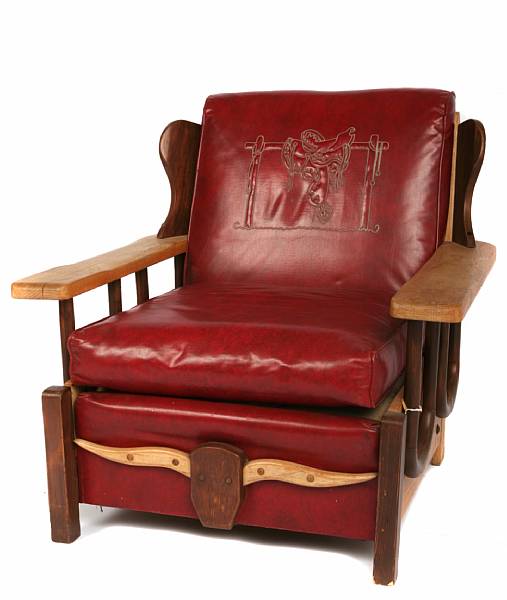 Appraisal: An American platform rocker and matching armchair with Western motifs