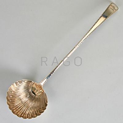 Appraisal: ENGLISH SILVER PUNCH LADLE Shell bowl handle with incised armorial