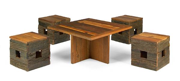 Appraisal: An exotic hardwood low table and four stools last quarter