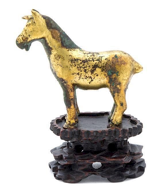 Appraisal: A Gilt Bronze Figure of a Horse Height inches A