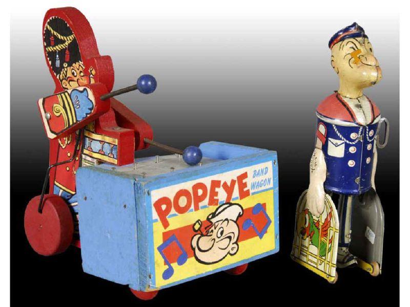 Appraisal: Lot of Popeye Toys Description Both '' T Marx tin