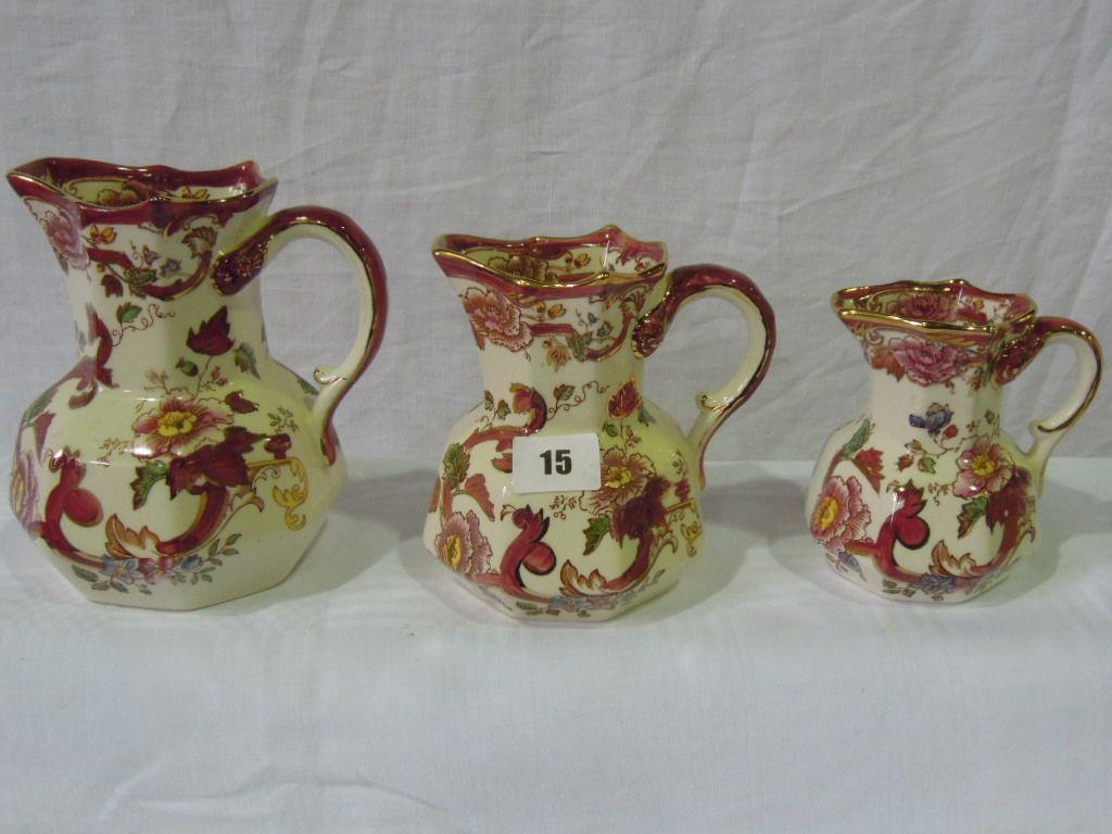 Appraisal: A set of three graduated Masons Mandalay red pattern jugs