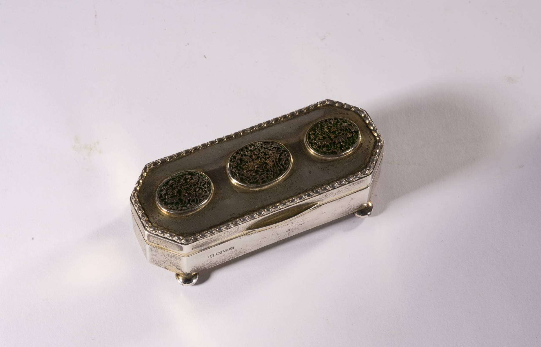 Appraisal: ENGLISH SILVER AND GREEN ENAMEL RECTANGULAR BOX WITH CANTED CORNERS