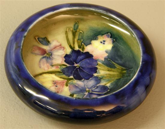 Appraisal: Small Moorcroft dish decorated with a floral sprig on a