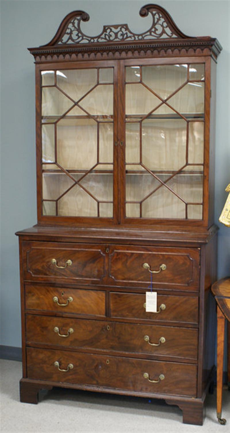 Appraisal: Georgian butler's secretary bookcase with desk drawer removable pierced scrolled