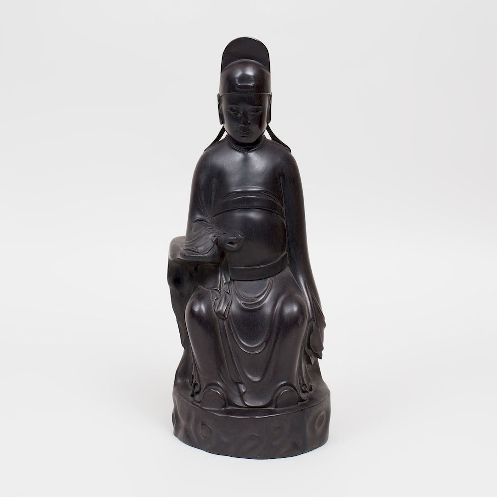 Appraisal: Chinese Carved Ebony Figure of a Seated Immortal in high