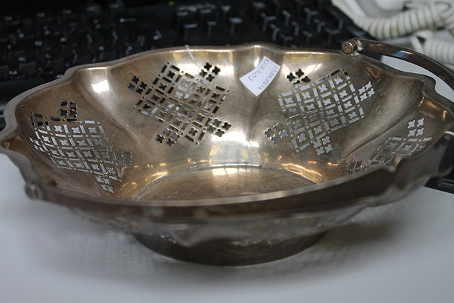 Appraisal: A SILVER BASKET of shaped circular form with pierced decoration