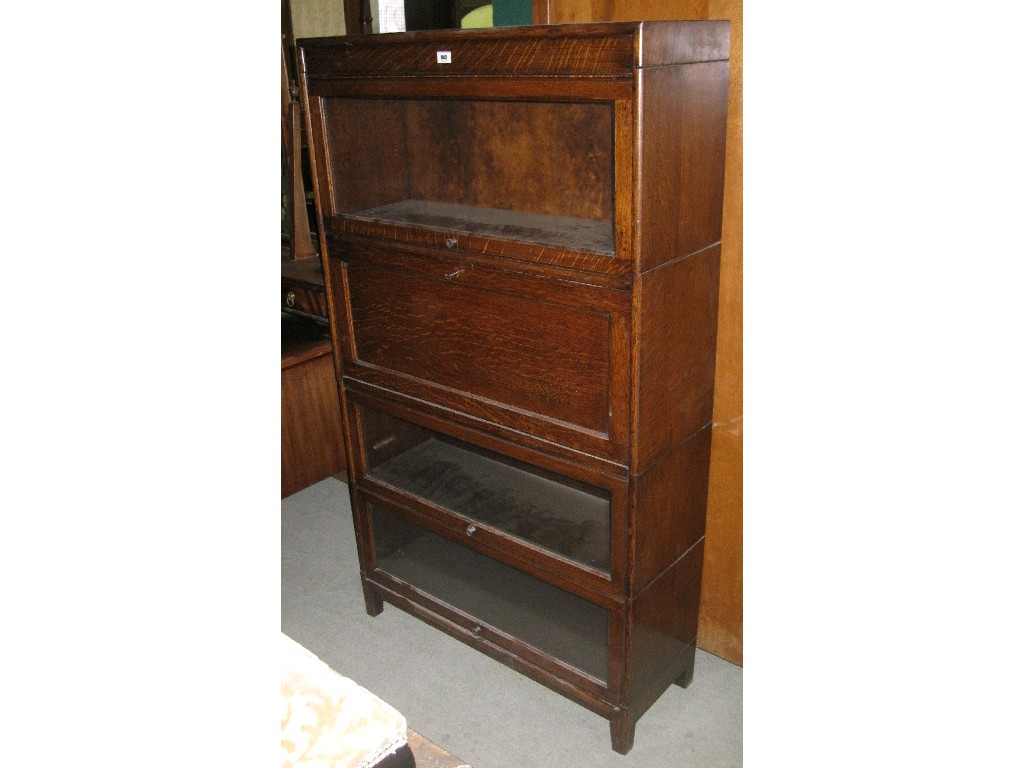 Appraisal: Oak sectional secretaire bookcase