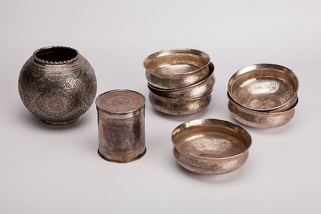 Appraisal: A SET OF SIX MIDDLE EASTERN SILVER COLOURED METAL CIRCULAR