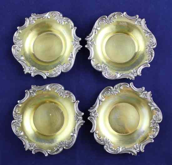 Appraisal: A set of four early Victorian parcel gilt silver butter