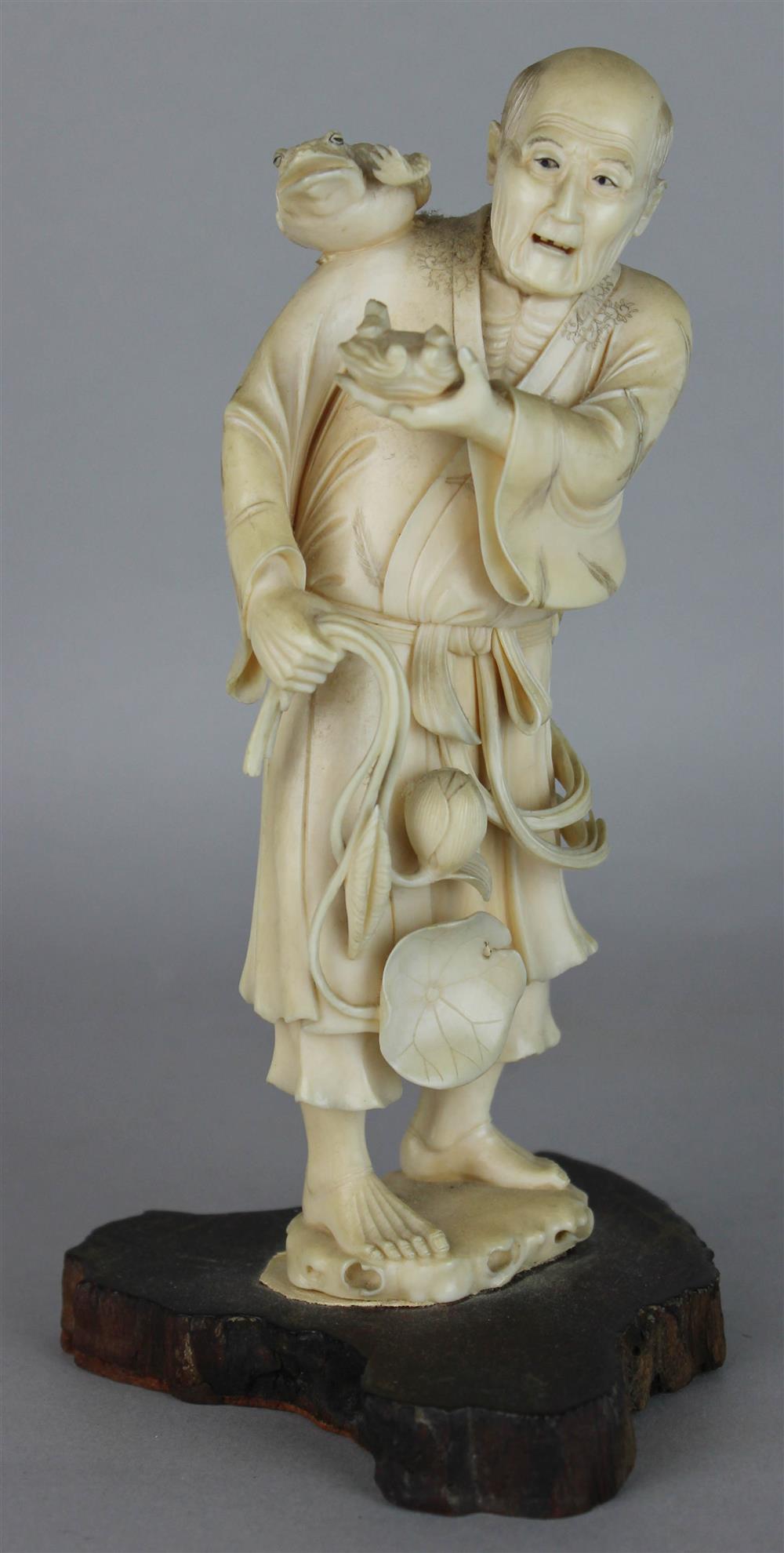 Appraisal: JAPANESE IVORY OKIMONO OF A PEASANT WITH A TOAD ON