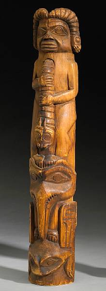 Appraisal: A Northwest Coast totem pole Concave at back depicting a