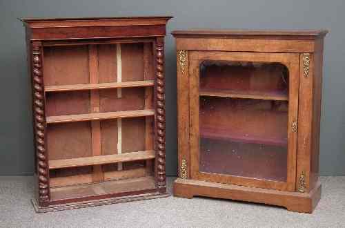 Appraisal: A Victorian walnut and gilt metal mounted dwarf display cabinet