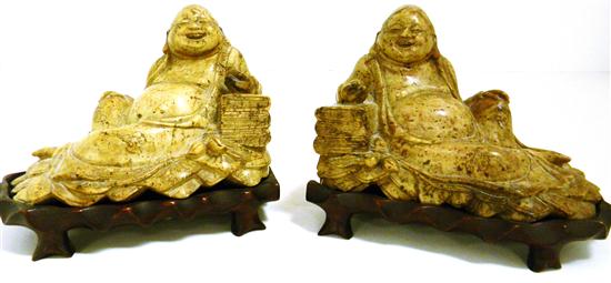 Appraisal: Pair of hardstone Asian carvings reclining deity '' h x