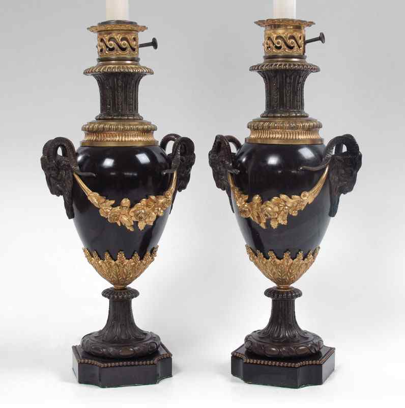 Appraisal: PAIR OF FRENCH EMPIRE STYLE MARBLE RAMS HEAD LAMPS Black