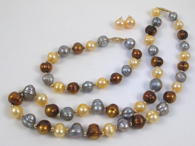 Appraisal: THREE ARTICLES OF PEARL JEWELRY including a multi-color pearl necklace