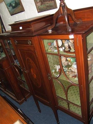 Appraisal: An Edwardian mahogany display cabinet with inlaid decoration the central