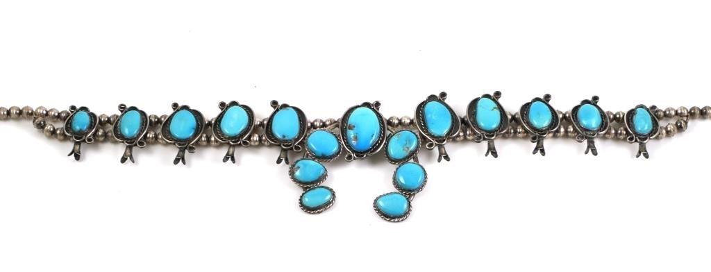 Appraisal: NAVAJO STERLING TURQUOISE SQUASH BLOSSOM NECKLACENative American Bisbee or Morenci