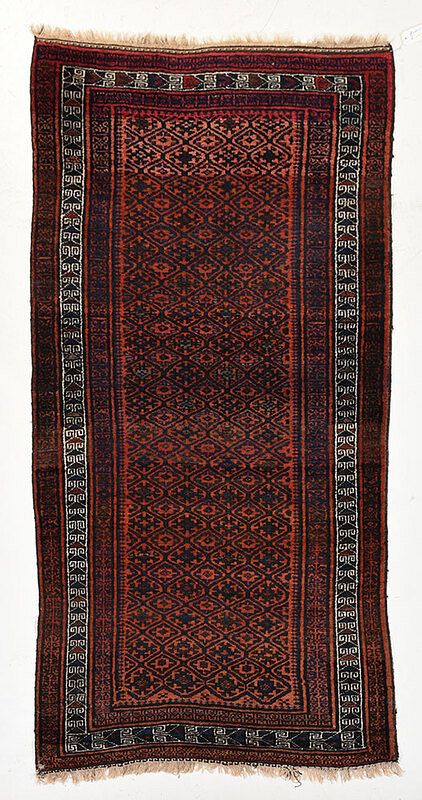 Appraisal: Baluch Rug Persia th century central field with repeating diamond