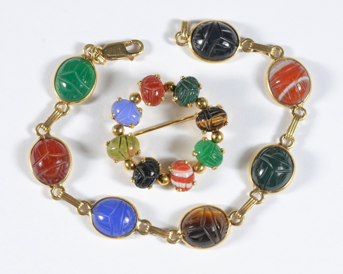 Appraisal: K YG scarab bracelet l and carved scarab circle pin