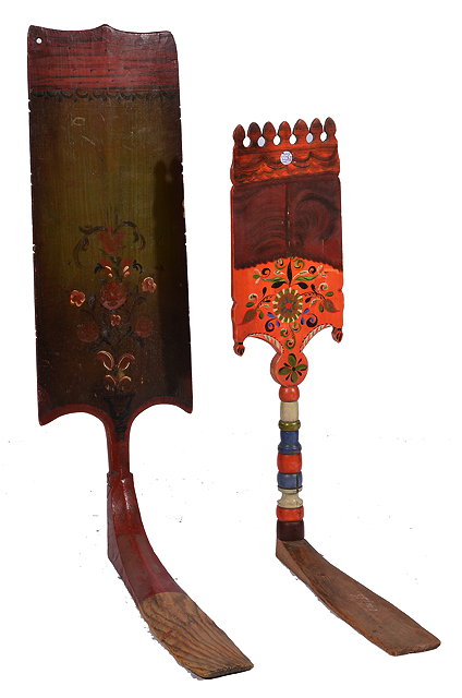 Appraisal: A RUSSIAN PAINTED PINE DISTAFF the paddle decorated with flowers