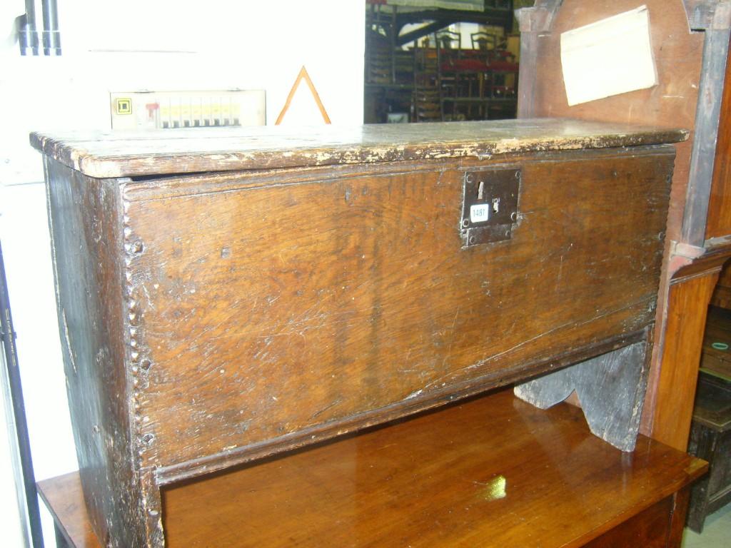 Appraisal: A Georgian oak -plank coffer with ironwork lock