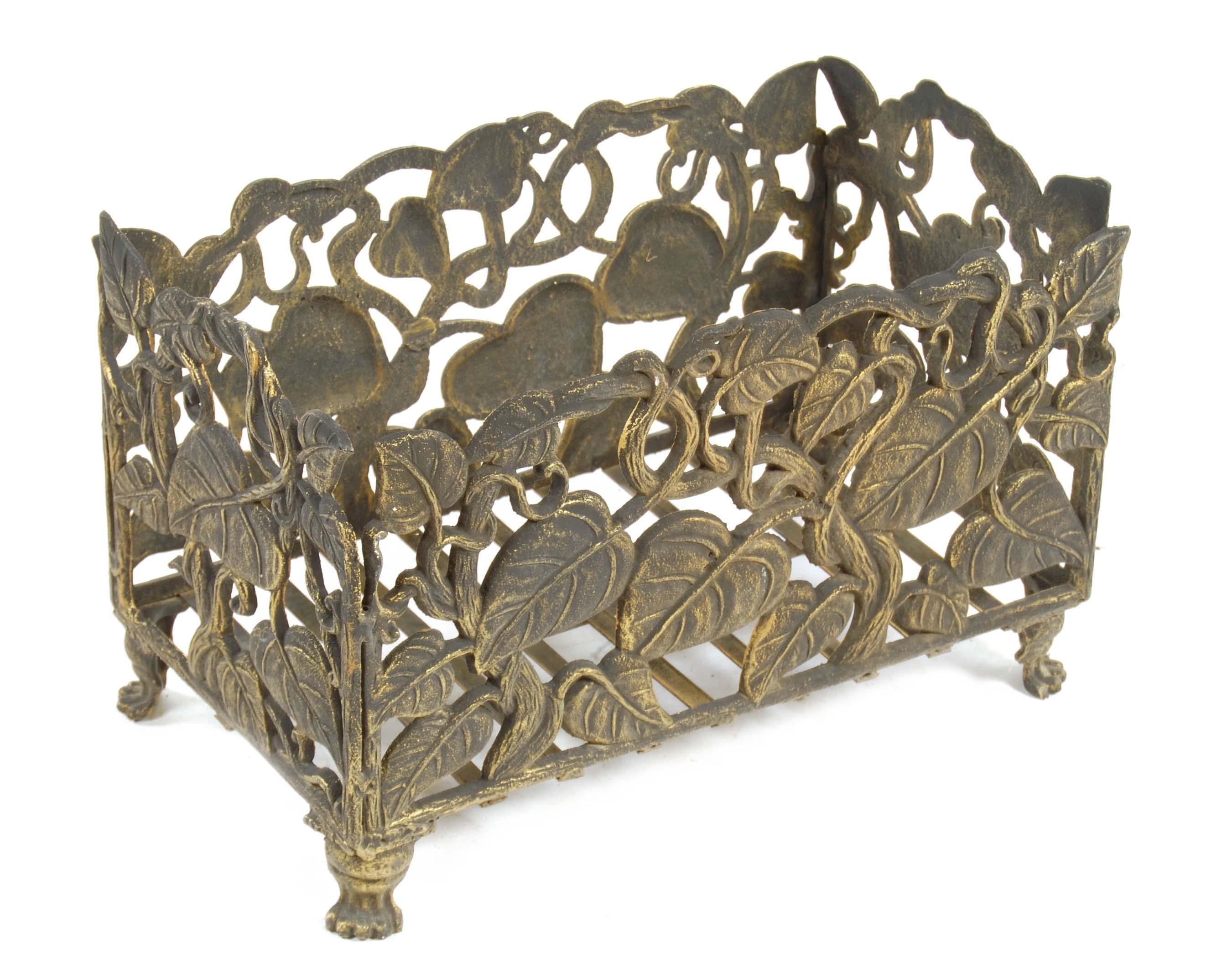 Appraisal: A cast metal fire basket