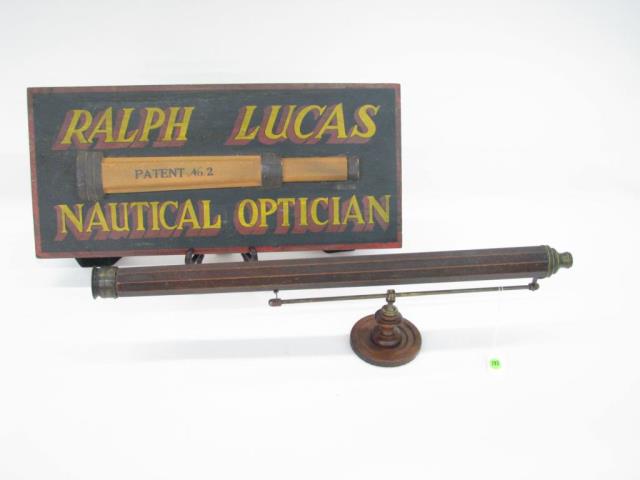 Appraisal: A nautical telescope and sign including an antique wooden telescope