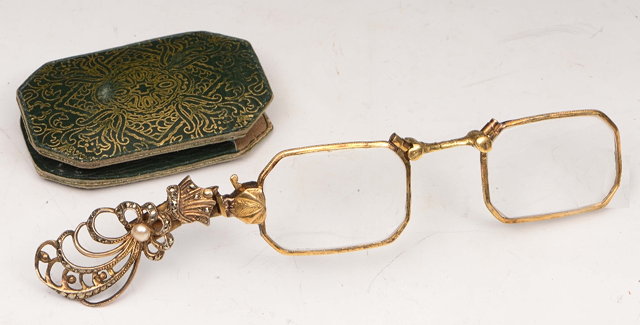 Appraisal: A PAIR OF FRENCH PINCE NEZ of folding form in