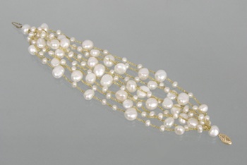 Appraisal: A Matching Pearl and Gold Thread Bracelet This bracelet measures