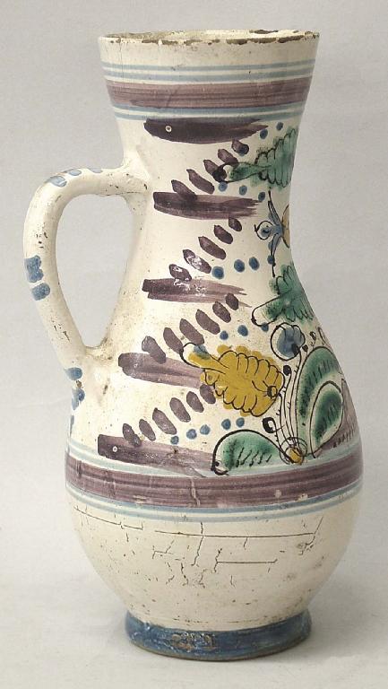 Appraisal: th century Delft ware polychrome baluster jug painted with foliate