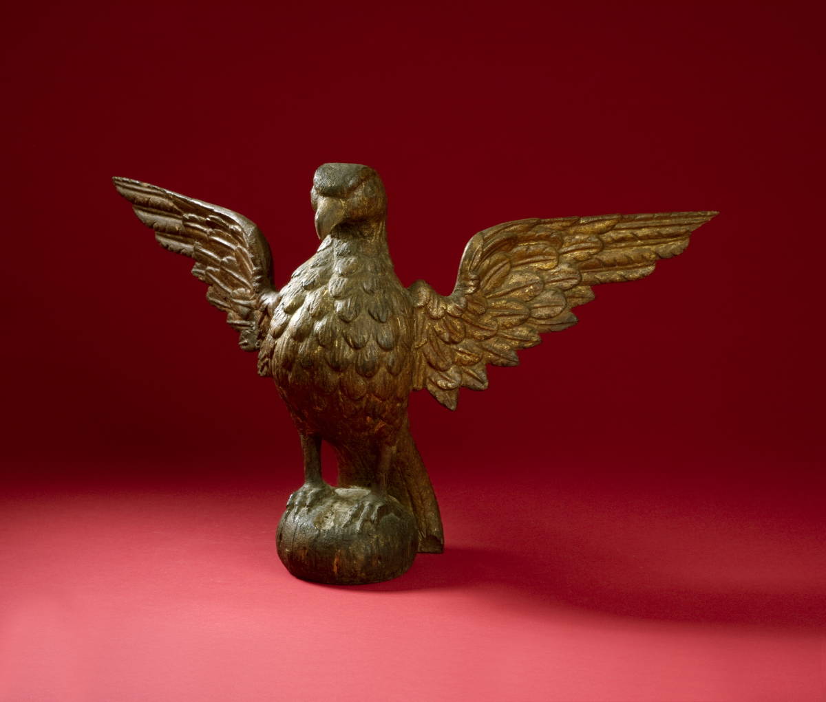 Appraisal: AMERICAN CARVED GILTWOOD SPREADWING EAGLE With puffed-out chest and wings