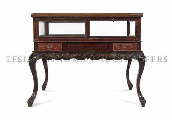 Appraisal: A Chinese Carved Wood Vitrine Table having glazed rectangular top