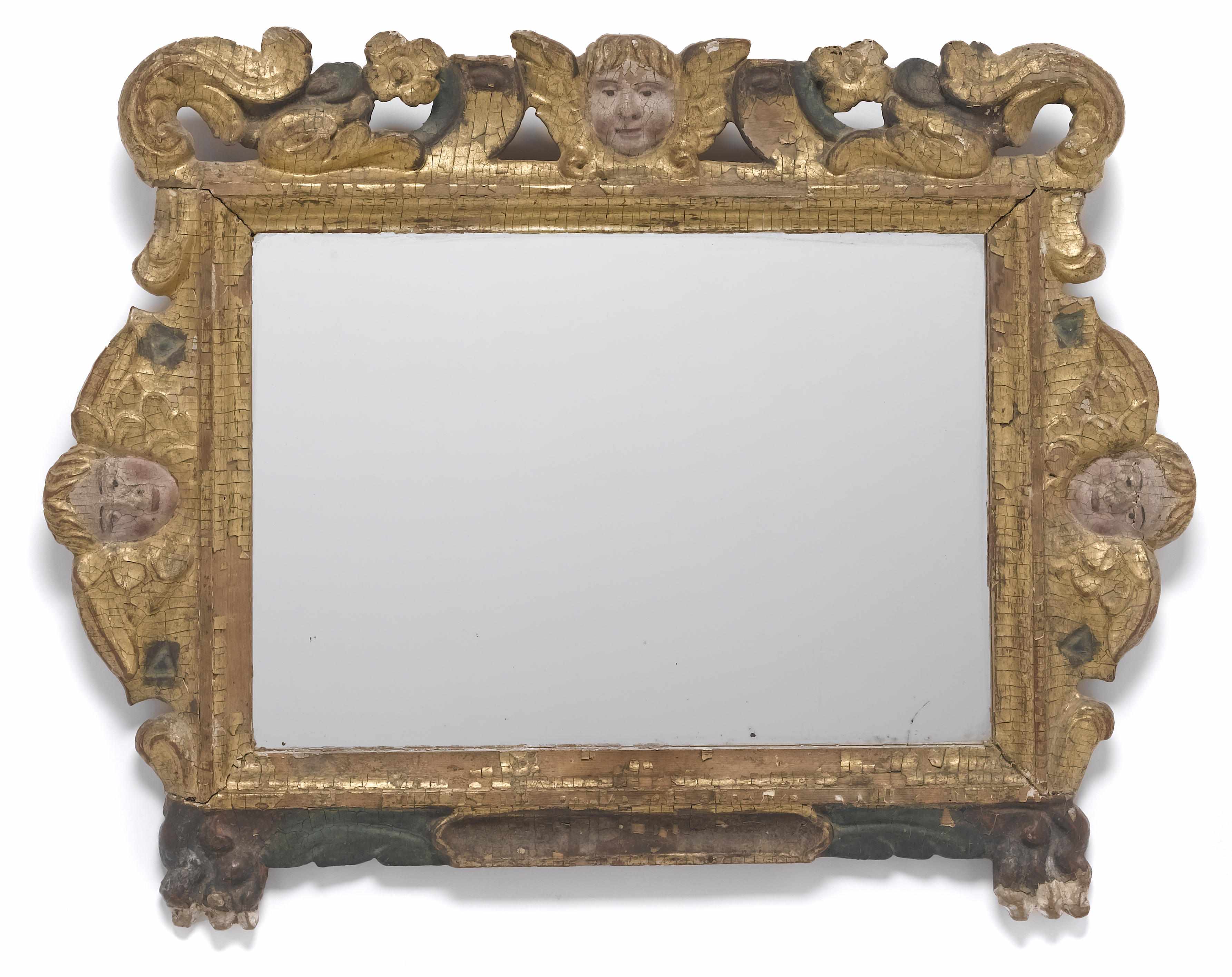 Appraisal: A Spanish colonial partial paint decorated and giltwood mirror late