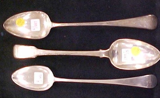 Appraisal: STERLING Three London-made serving spoons various monograms a marked -