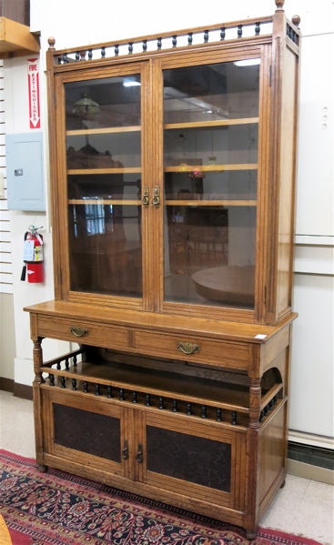 Appraisal: AN OAK CABINET BOOKCASE ON STAND English th century the