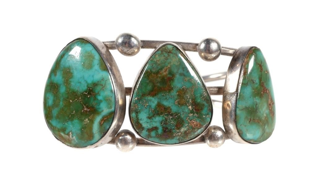 Appraisal: STERLING AND TURQUOISE CUFF BRACELETSterling silver and turquoise cuff bracelet