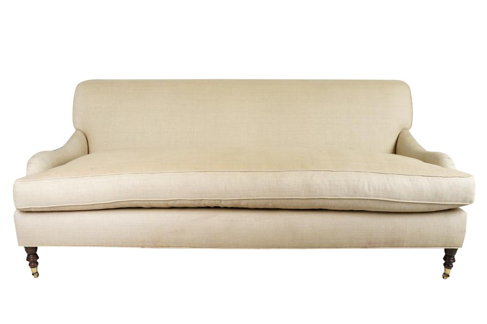 Appraisal: UPHOLSTERED SOFAcovered with heavyweight beige linen loose down-filled seat cushion