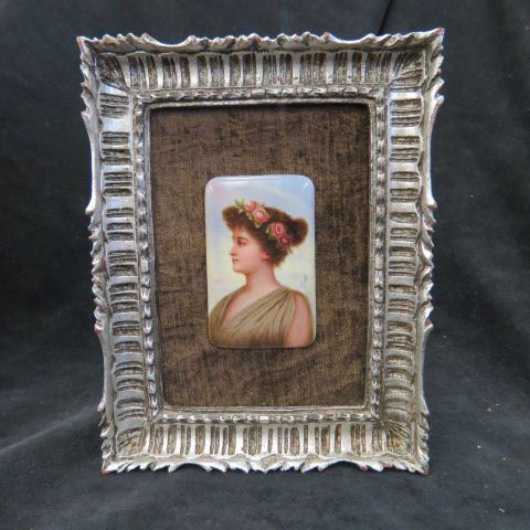 Appraisal: Miniature Painting on Porcelain Plaque young lady flowers in hair