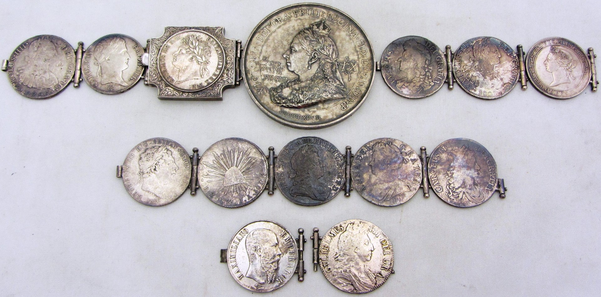 Appraisal: A silver waistbelt made from thirteen silver crown sized coins