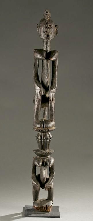 Appraisal: Dogon totemic figures th c A totemic figure Mali Dogon