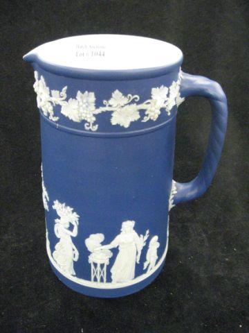 Appraisal: Wedgwood Dark Blue Jasperware Tall Pitcher classical scenes grape vine