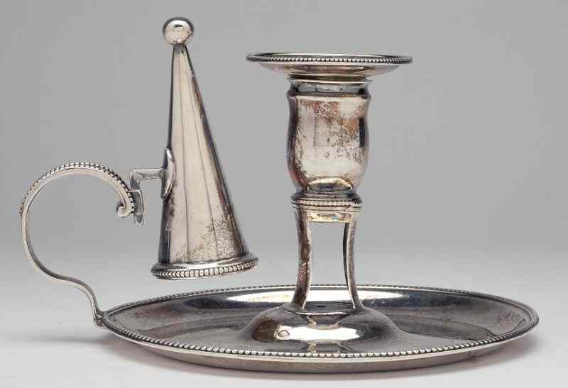 Appraisal: English Silver Chamberstickthe candlestick with beaded details London hallmarks and