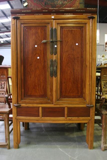 Appraisal: A Shanghaianese elm and huanghuali wood cabinet ivory inlaid detail