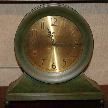 Appraisal: Patinated-Bronze Ship's Clock Estimate -