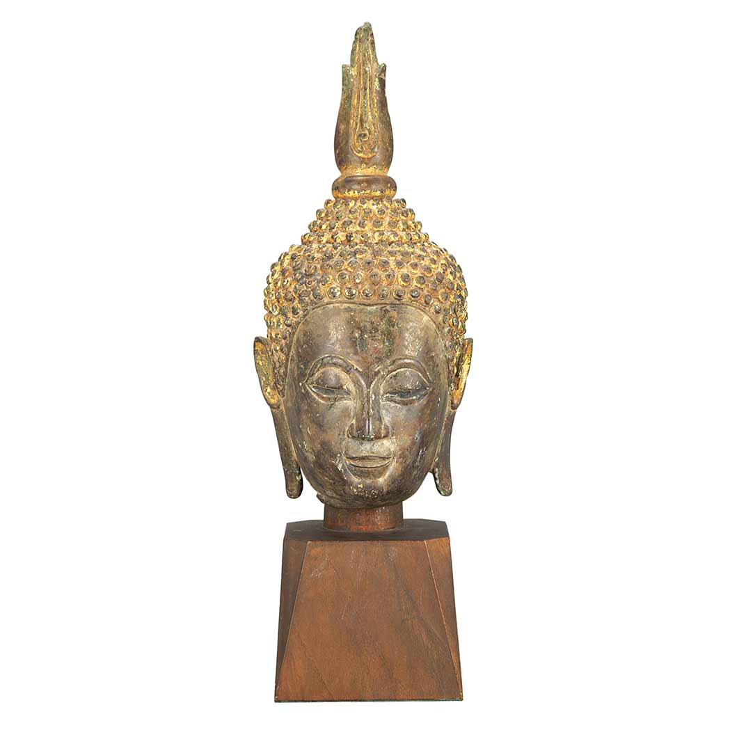 Appraisal: Thai Gilt-Bronze Head of Buddha th Century The downcast expression