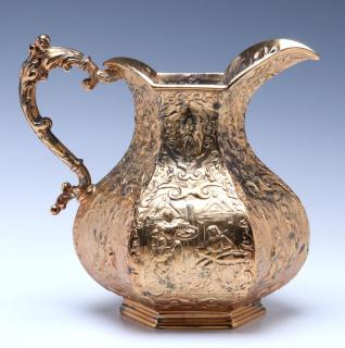 Appraisal: A Silver-plated paneled pear-form pitcher featuring Renaissance figural scenes within