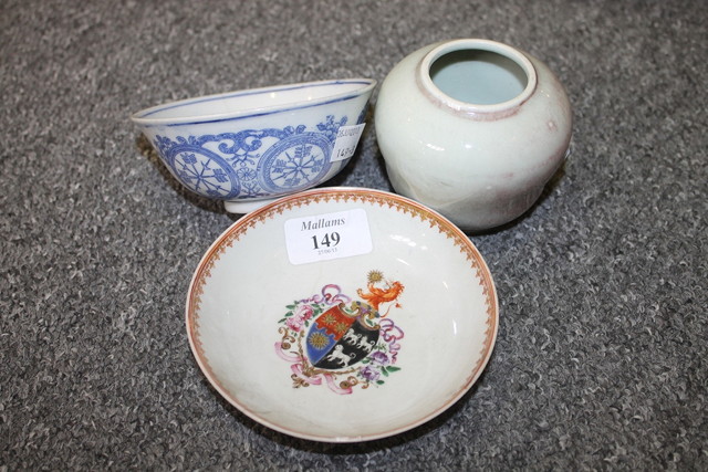 Appraisal: A CHINESE ARMORIAL SAUCER a blue and white bowl and